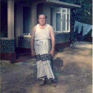 Robert E. Hill in sarong